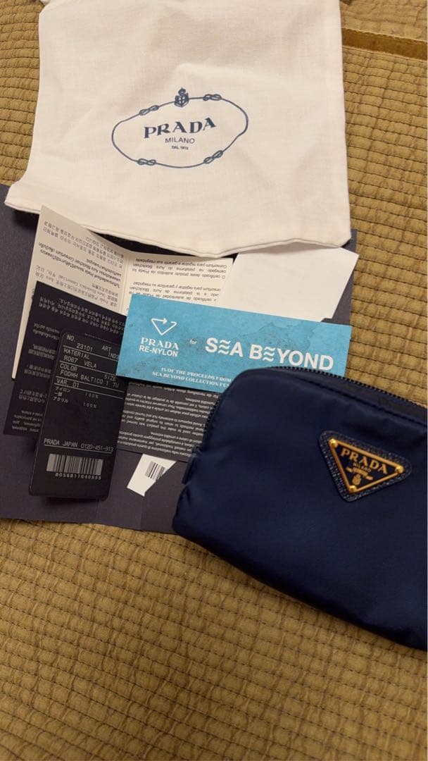 PRADAマイクロ Re-Nylon ポーチ カラーバルティックブルー