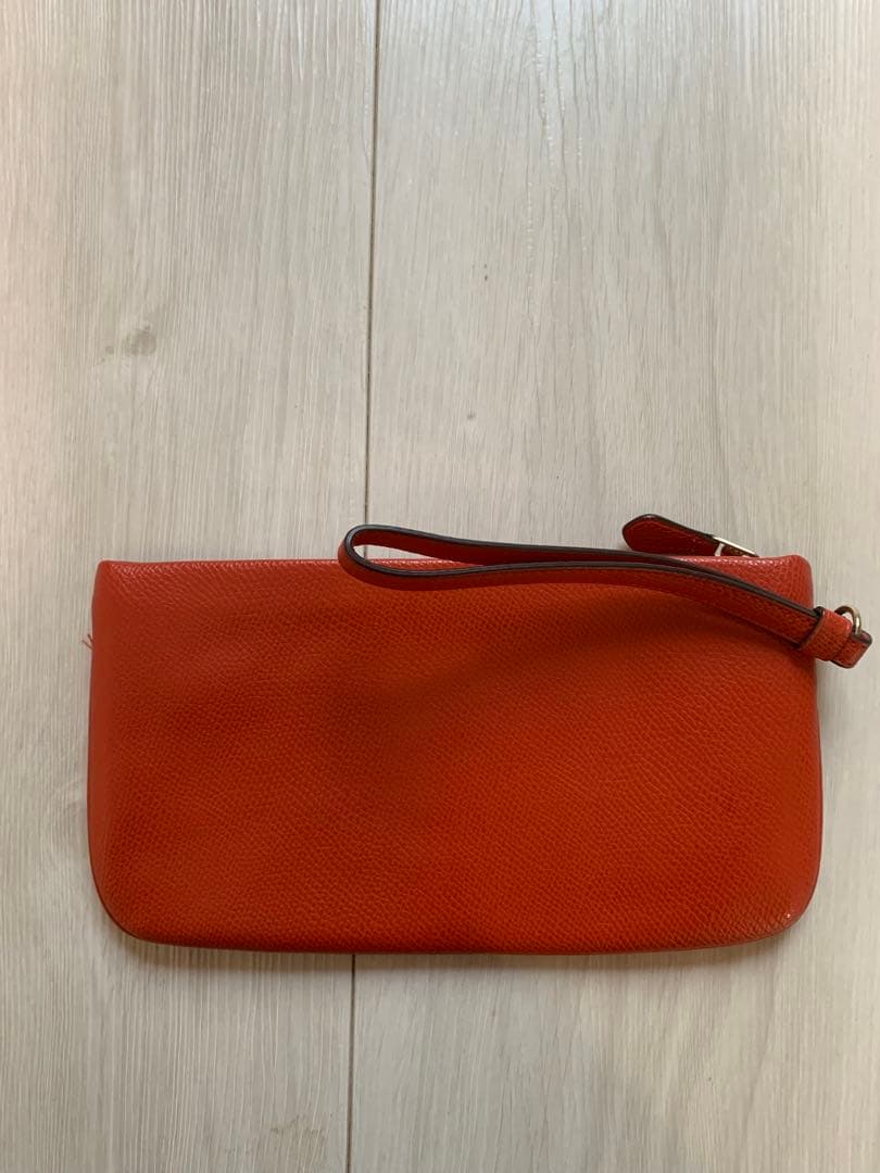 3,000円引！【ほぼ新品】COACHのリストレット/ポーチ（朱色/赤）レザー