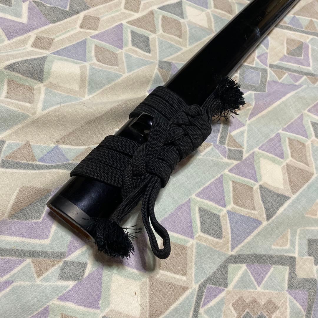 上級居合刀 黒柄 鶴波図楕円鍔 黒呂鞘