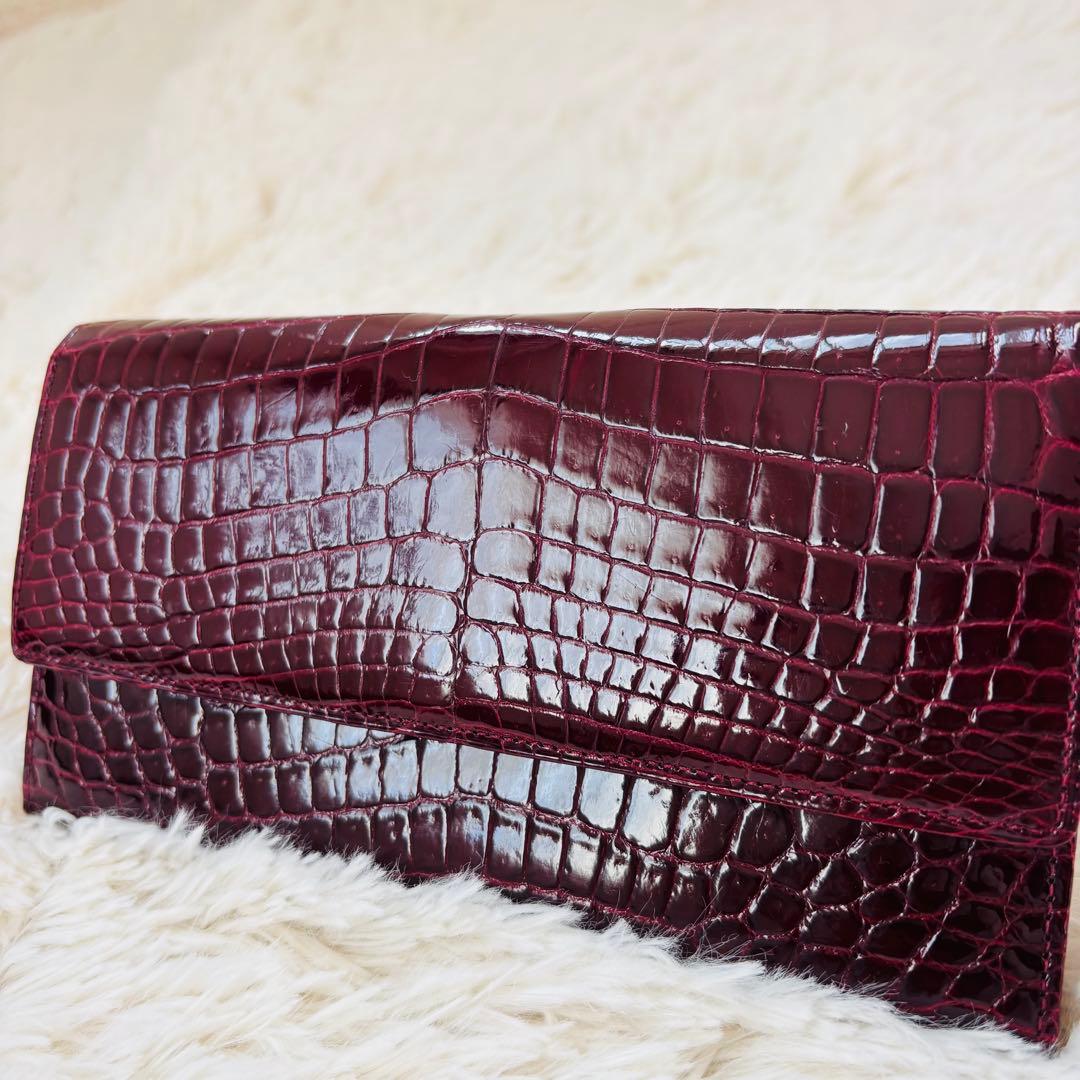 ＪＲＡ シャイニークロコダイル 長財布 ワインレッド 穿孔 クロコダイル 財布