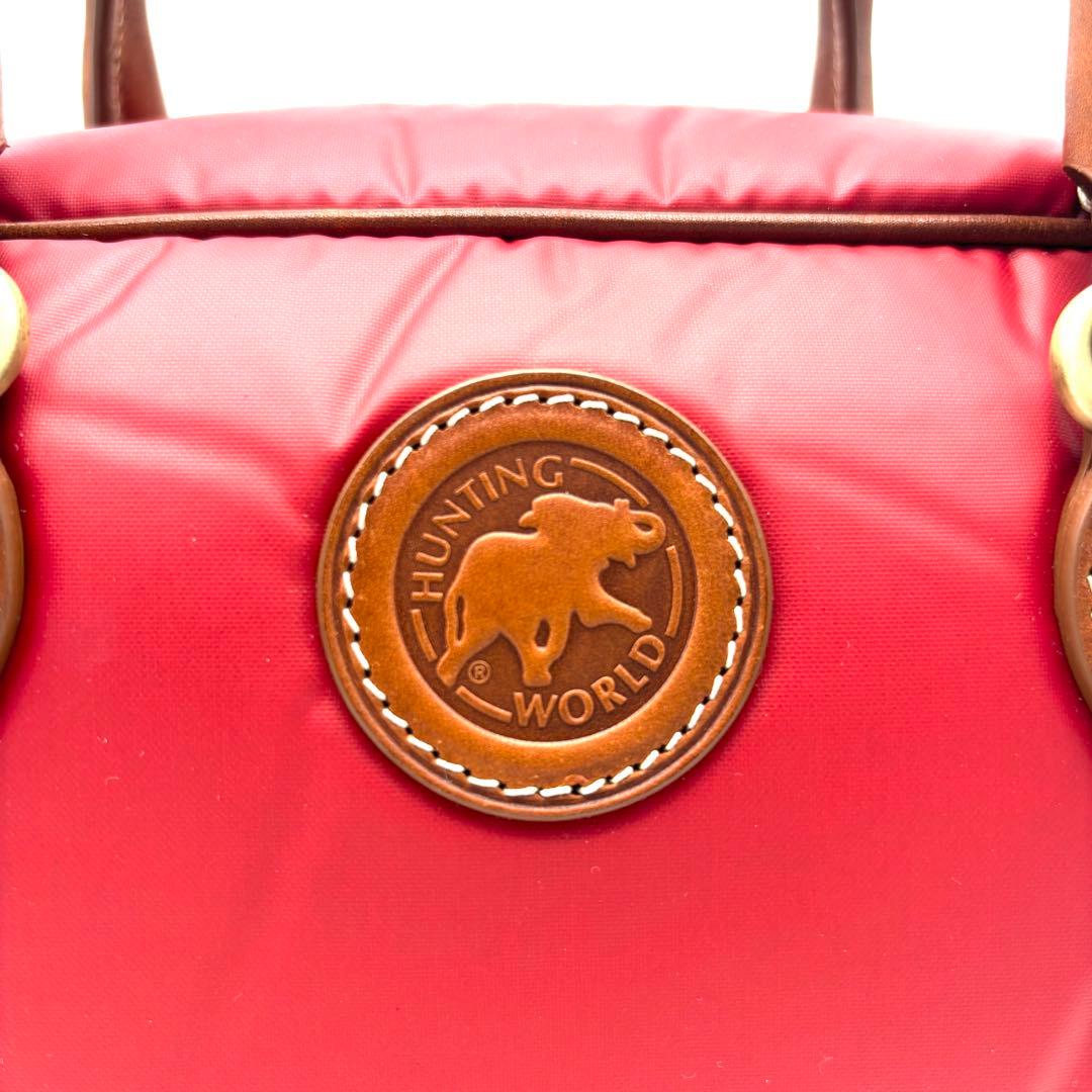 未使用に近い ハンティングワールド ハンドバッグ バチュークロス ロゴ レッド