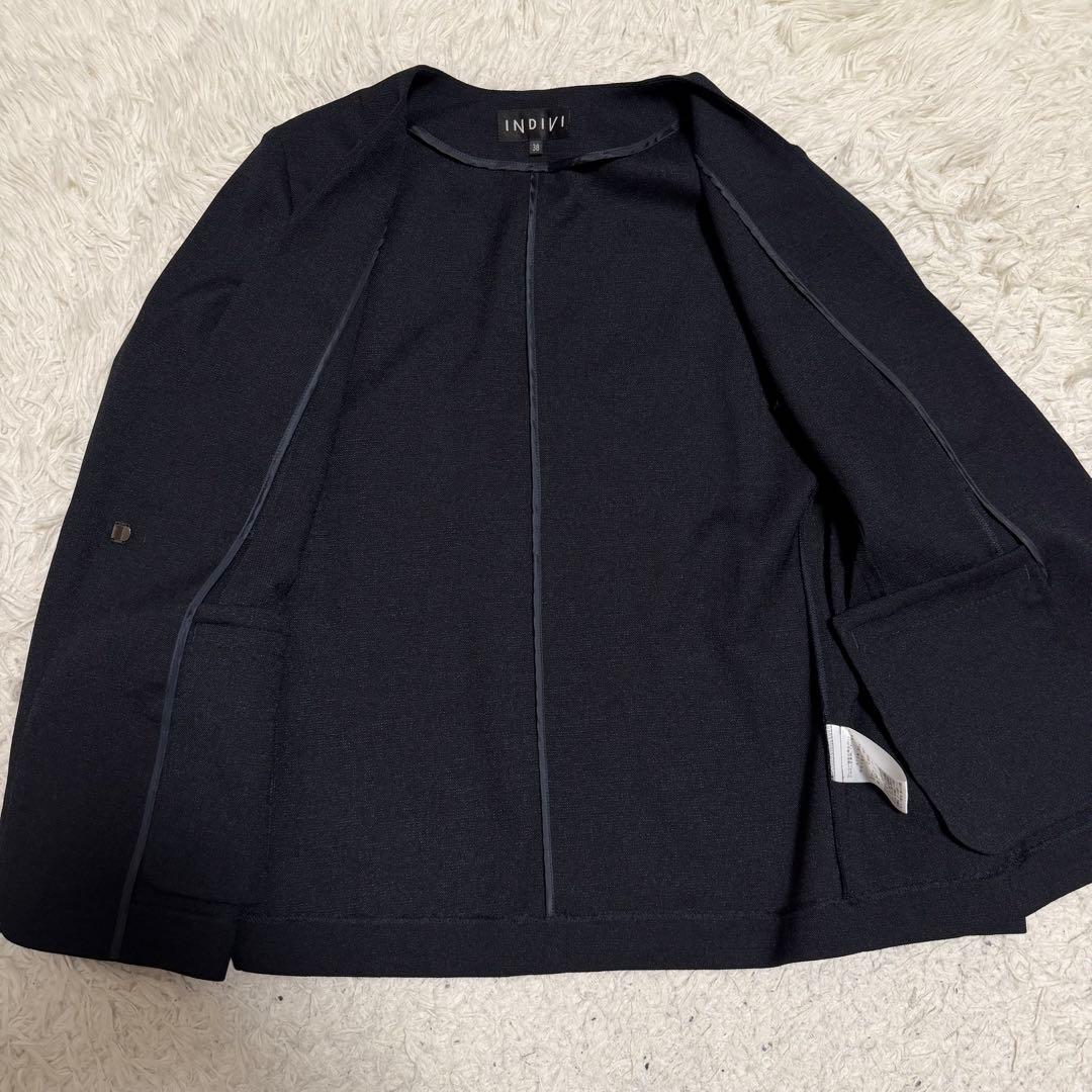 25年製未使用級　indivi パンツスーツ　セットアップ　ウォッシャブル　紺色