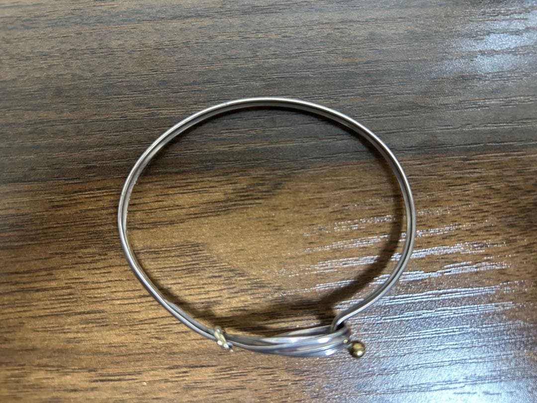 ティファニー フック&アイ ラブノット バングル 925 750