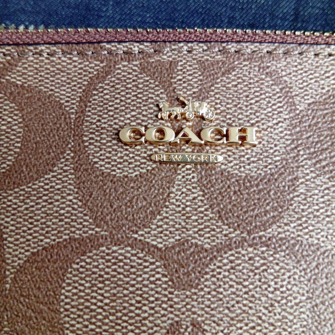 みかんぼうや　新品　COACH ダブルジップポーチ　アウトレット