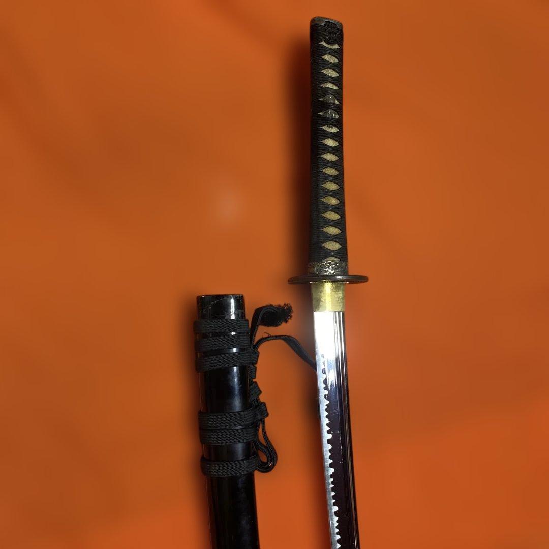 居合刀 黒柄 日出鳥木波図丸鍔 点炎黒呂鞘