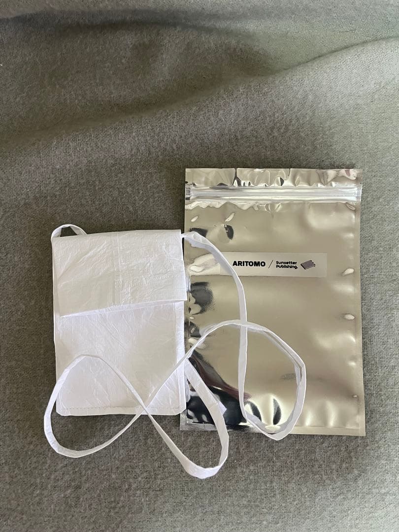 ARITOMO sunsetterpublishing カメラポーチ