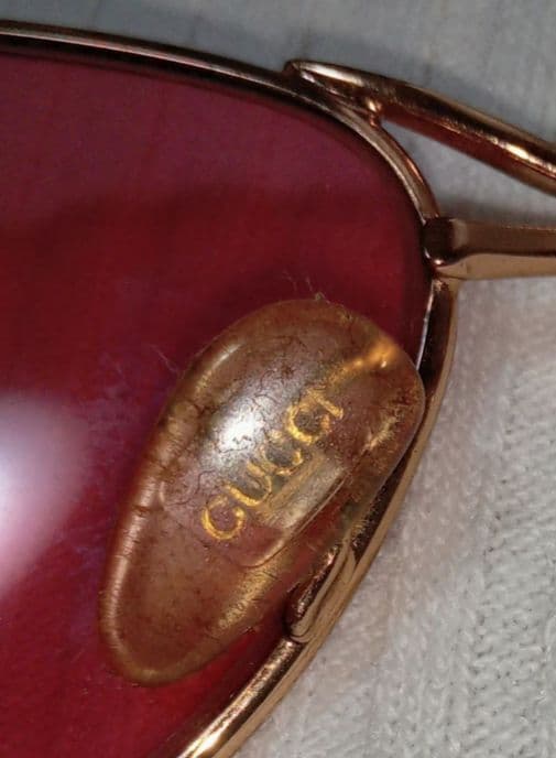 GUCCI メタルフレーム レッド レンズ のサングラス グッチ