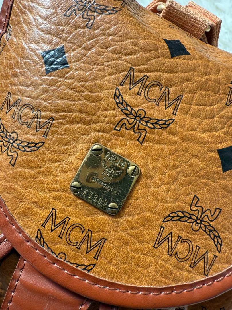 MCM ミニリュック　巾着　ブラウン　ロゴ総柄