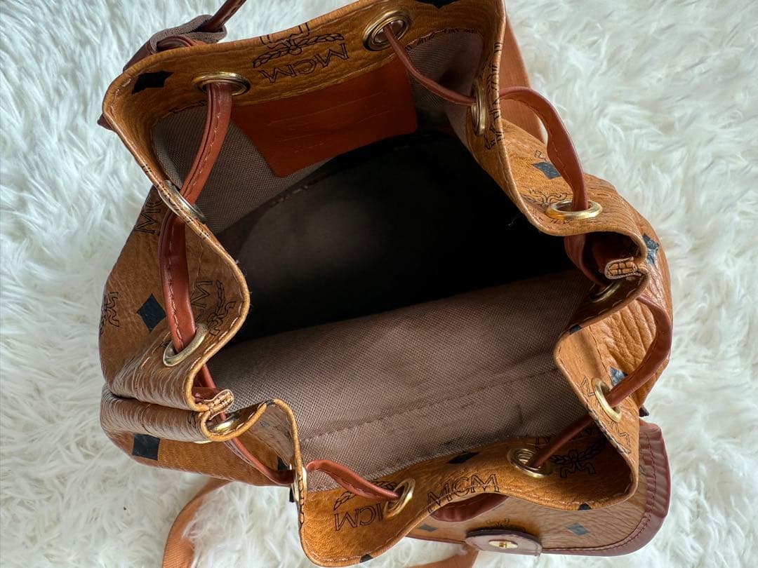 MCM ミニリュック　巾着　ブラウン　ロゴ総柄