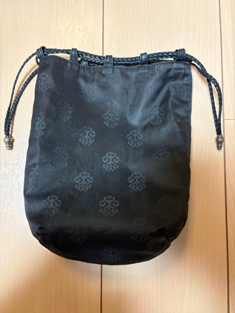 クロスパッチドローストリングサックレザー巾着ハンドバッグ