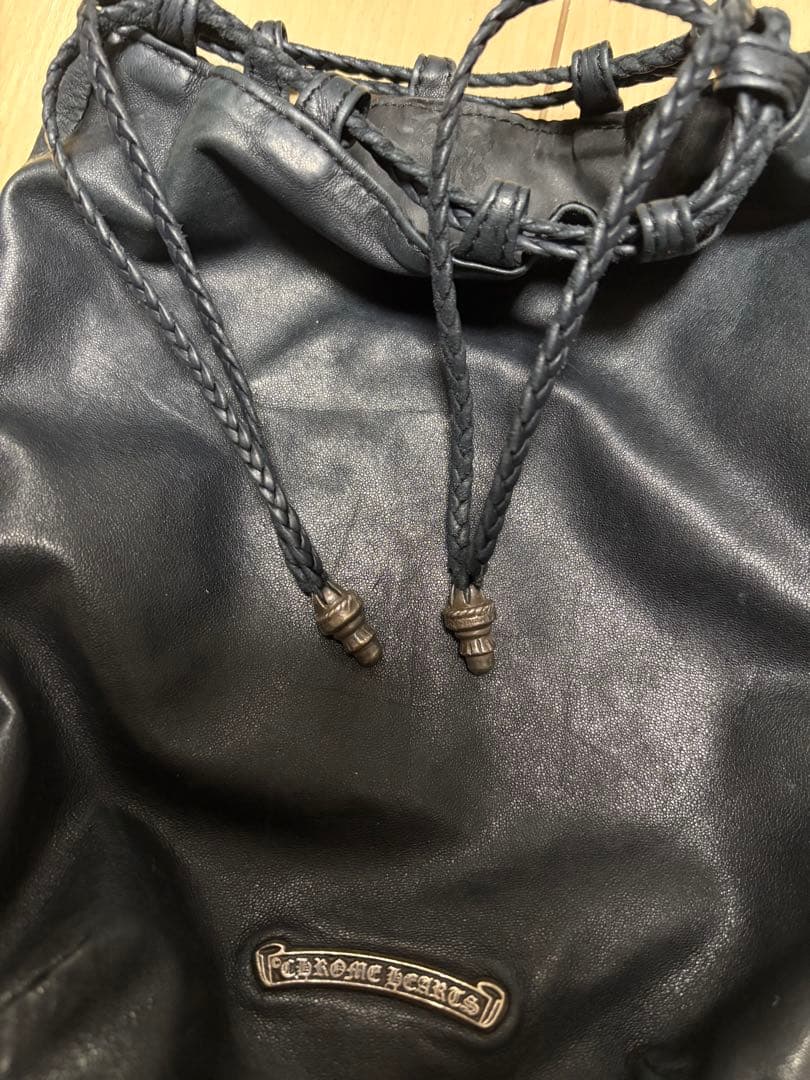 クロスパッチドローストリングサックレザー巾着ハンドバッグ