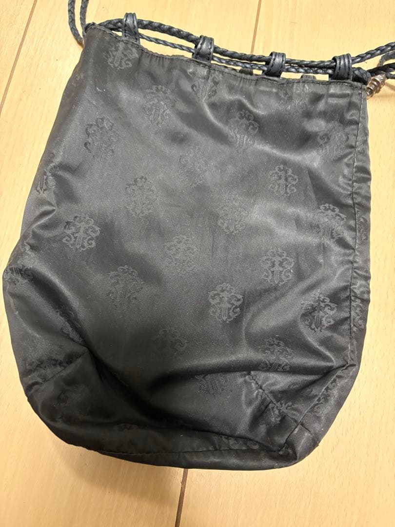 クロスパッチドローストリングサックレザー巾着ハンドバッグ