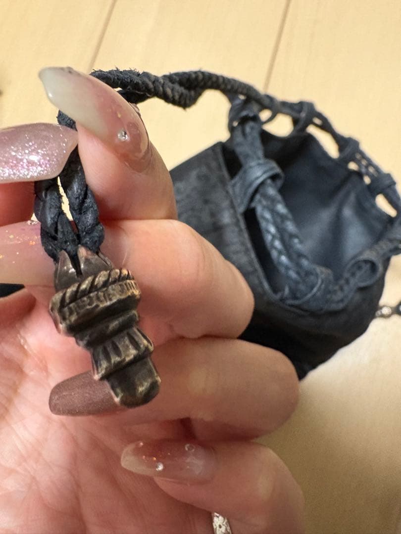 クロスパッチドローストリングサックレザー巾着ハンドバッグ