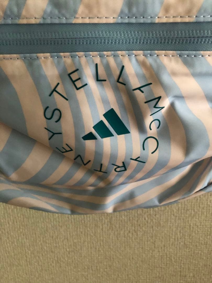 アーセナル ドローストリングバックパック 水色ストライプ　ステラマッカートニー