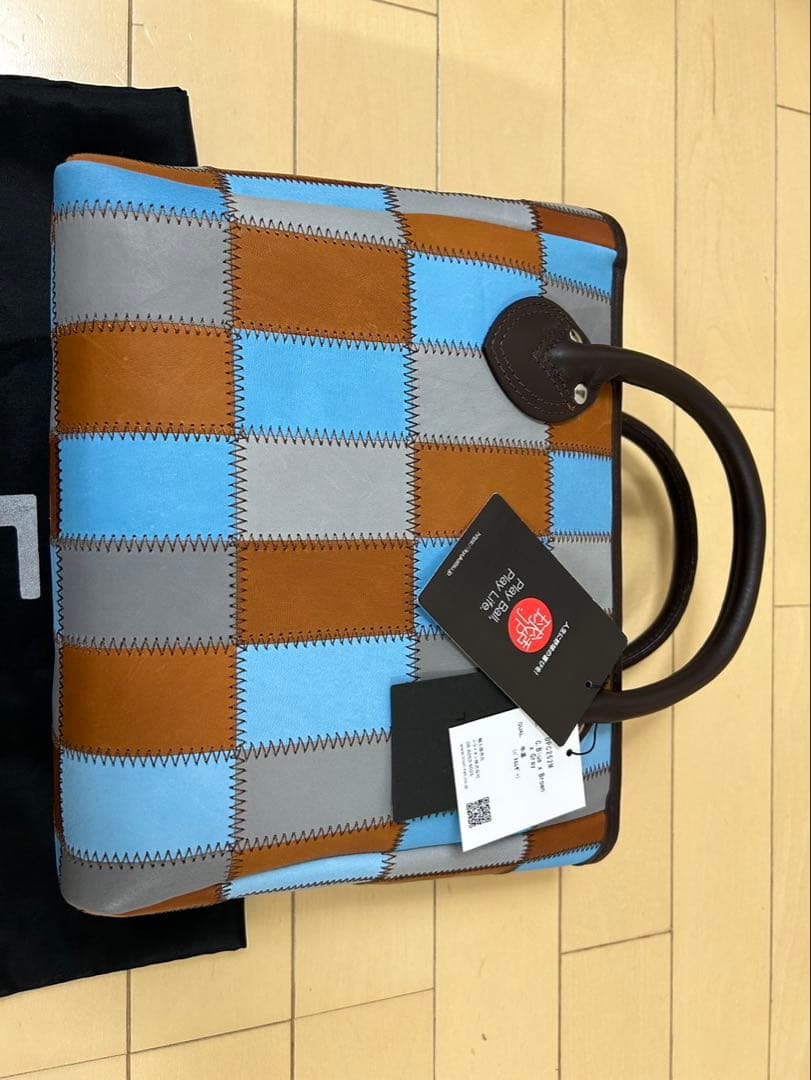 値下げしました‼️【美品・新品未使用】TRION 本革 ハンドバッグ 男女兼用