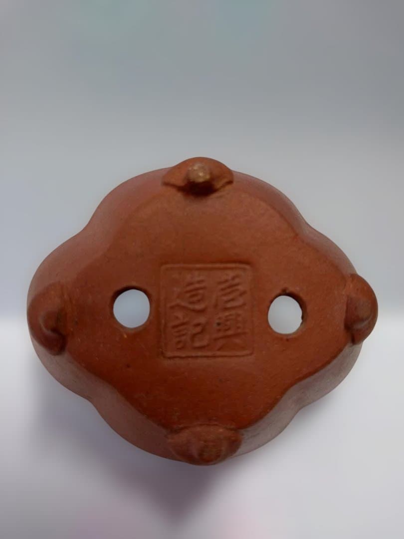 オレンジ色の脚付き小品盆栽鉢