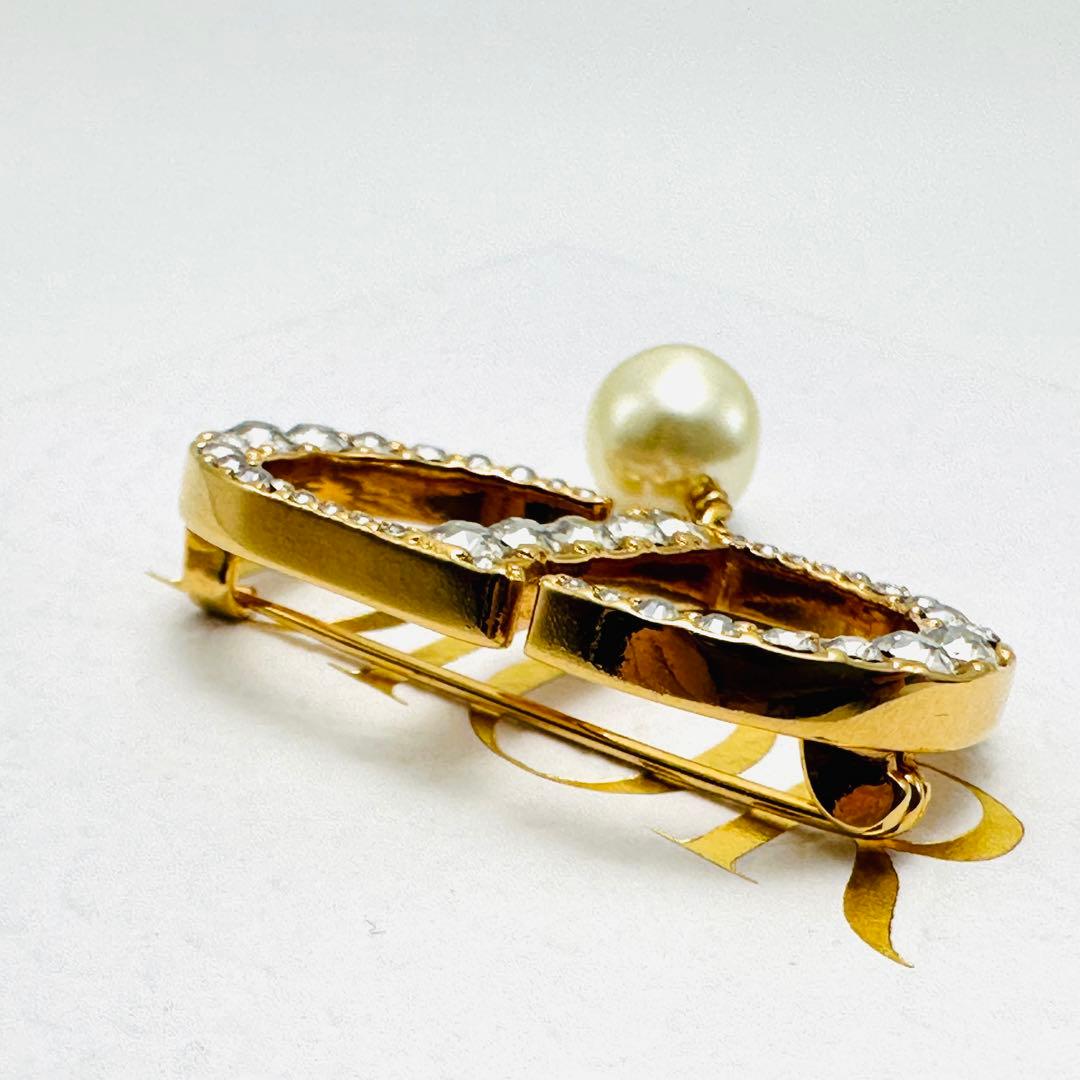 DIOR プチCD ブローチ　ラインストーン　ロゴ　ゴールドカラー　レジンパール
