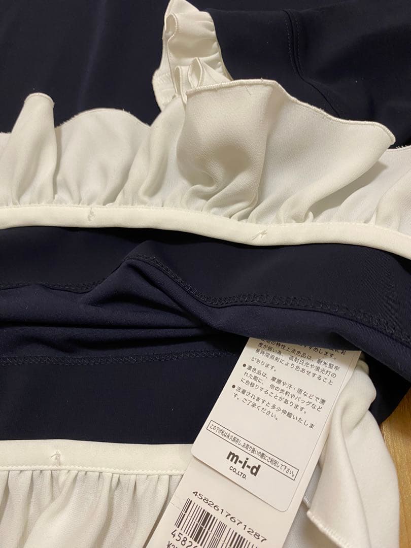 mプルミエ　未使用タグ付きネイビー フリル付き長袖トップス