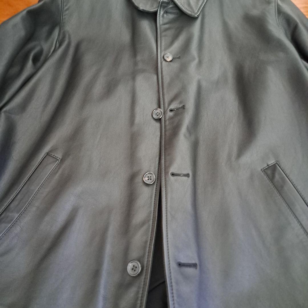 黒レザージャケット ボタン留め 襟付き