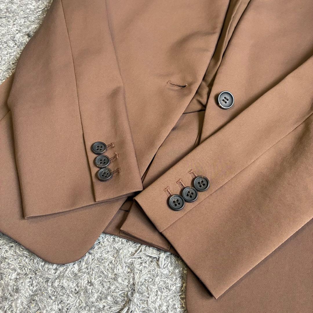 【美品】PLST ノーカラ―パンツスーツ コンフォートリュクス 茶色 S/XS