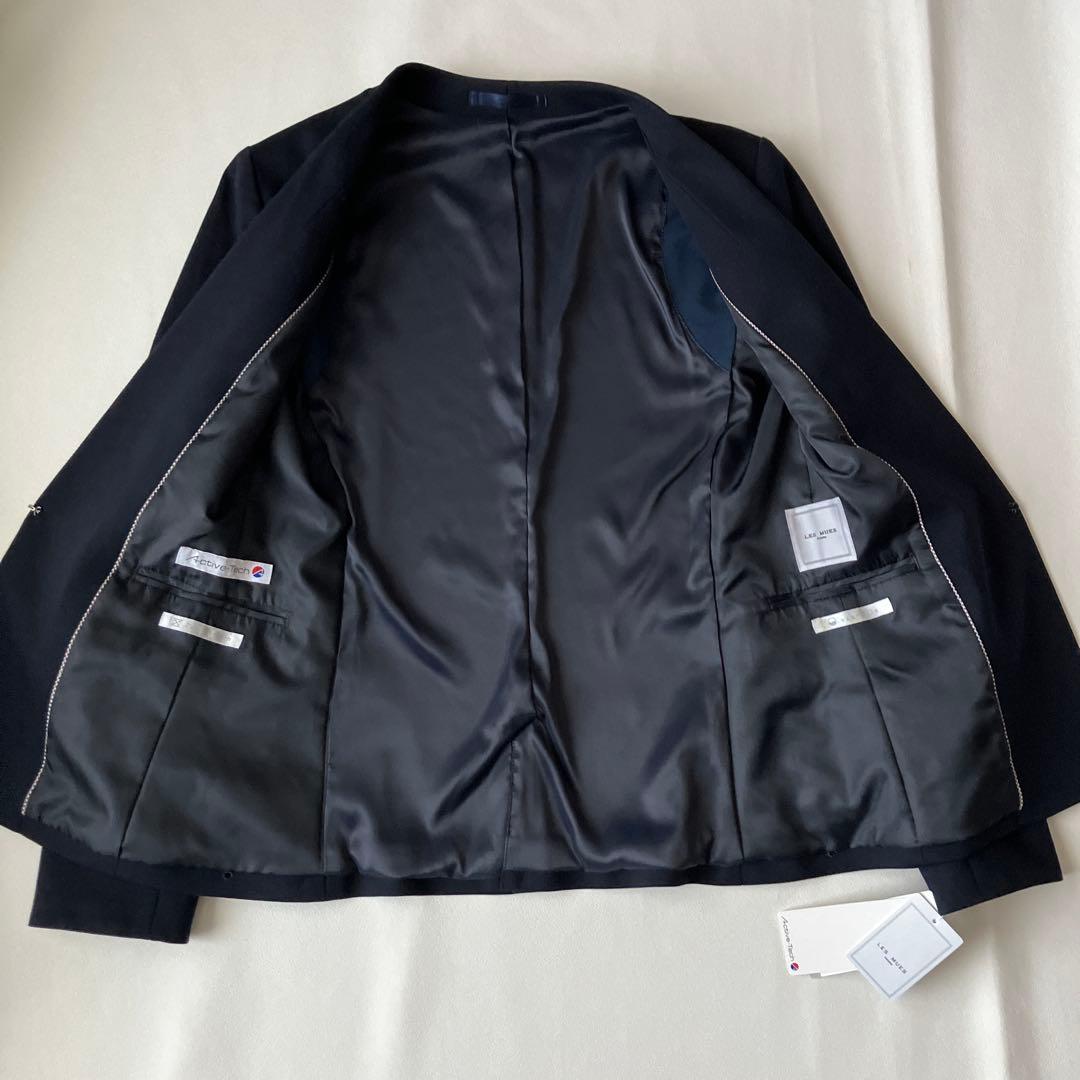 新品【アオキ　LES MUES】ネイビー ノーカラー パンツスーツ　レディース