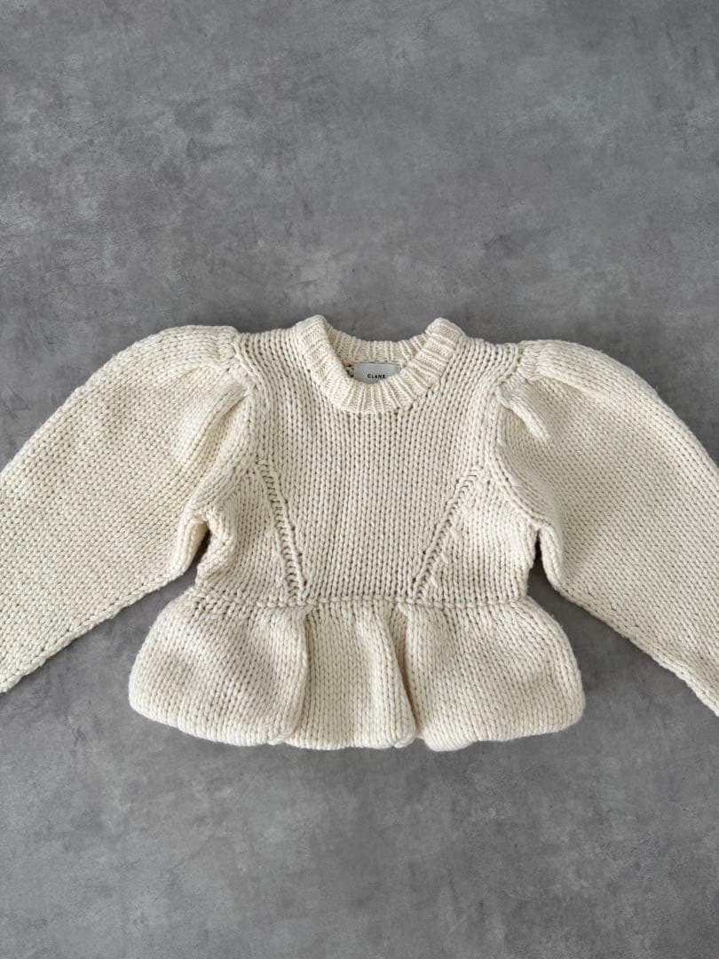 CLANE PEPLUM HAND KNIT TOPSアイボリー サイズ2