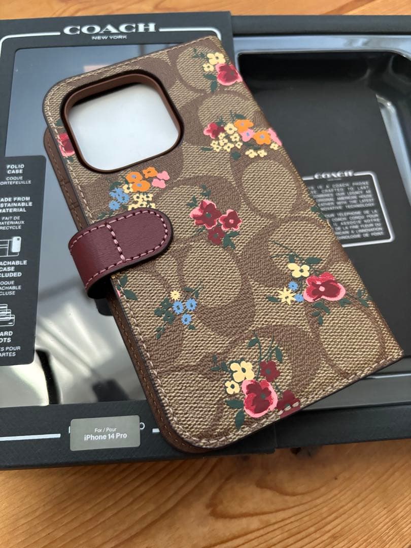 新品 coach スマホケース フラワー iPhone14Pro