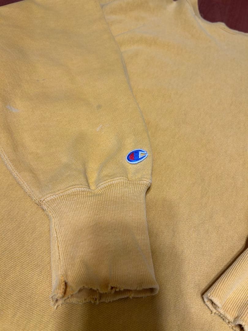 Champion Iowa 61 リバースウィーブイエロースウェット