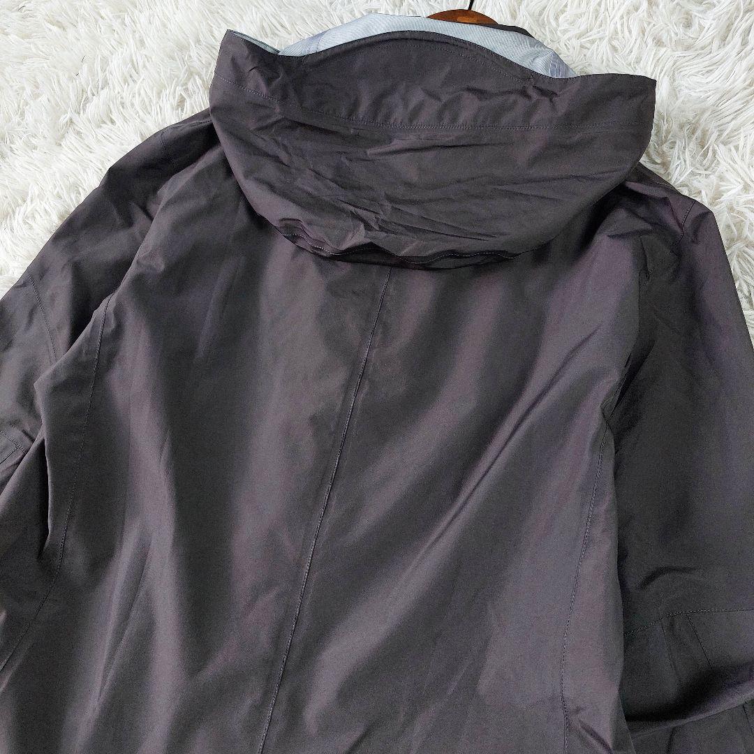 美品 tilak Poutrnik ワンポイント ロゴ ステンカラーレインコート