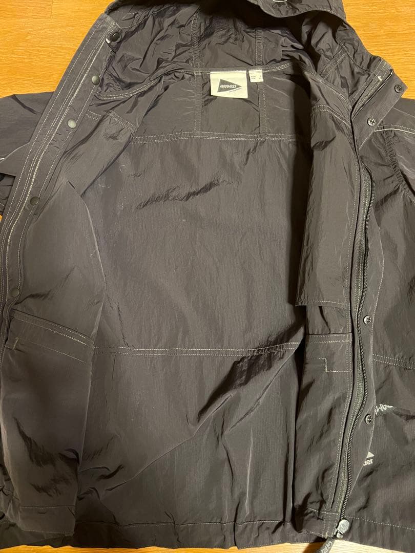 Gramicci x AND WANDERパッチワークウィンドパーカー Sサイズ