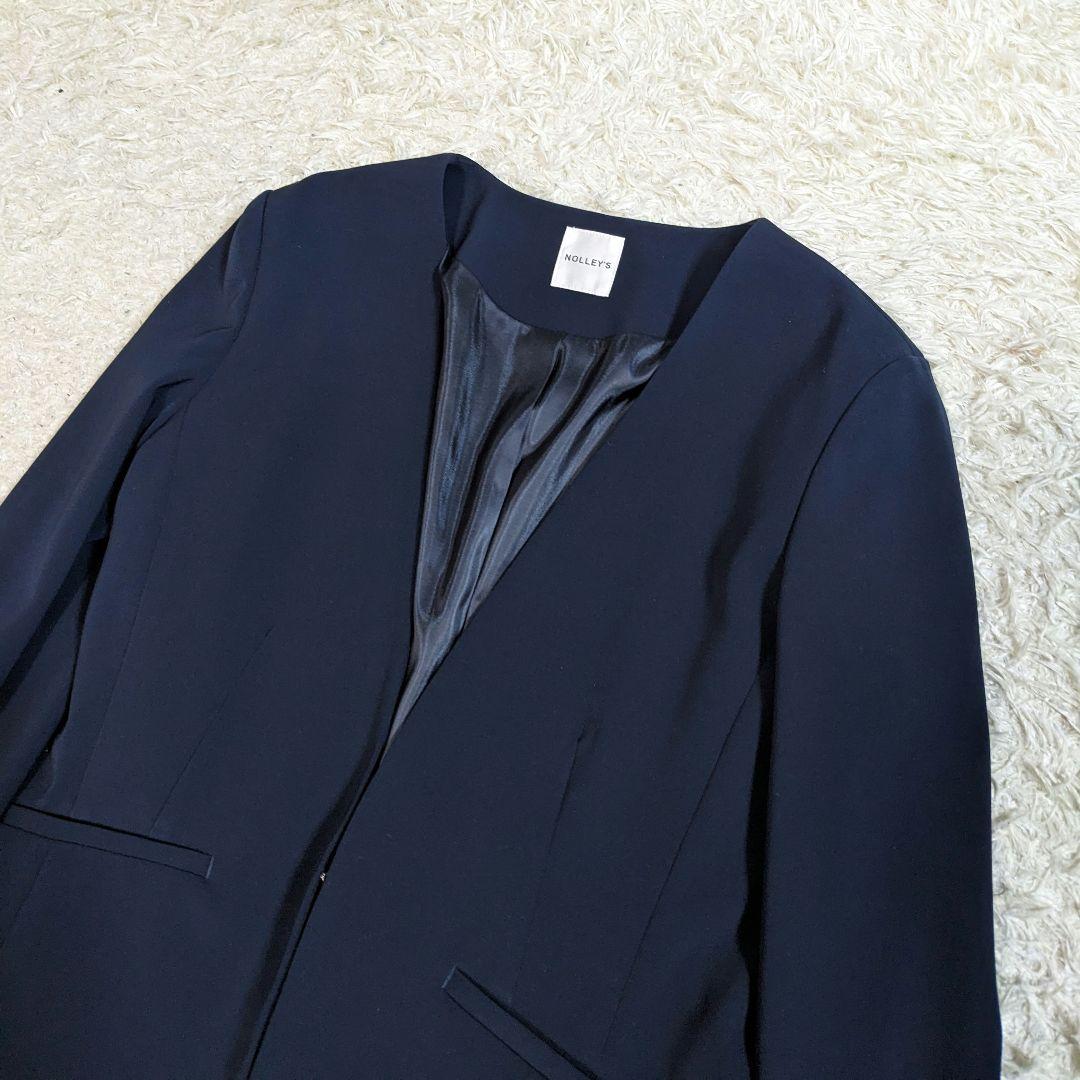 ノーリーズ　セットアップ　ノーカラー　ストレッチ　洗える　ネイビー　現行