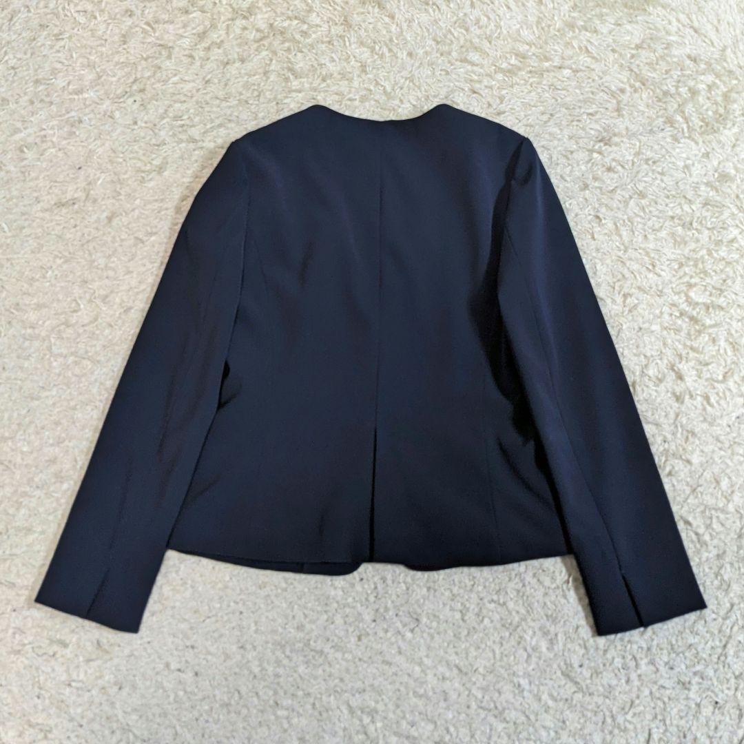 ノーリーズ　セットアップ　ノーカラー　ストレッチ　洗える　ネイビー　現行