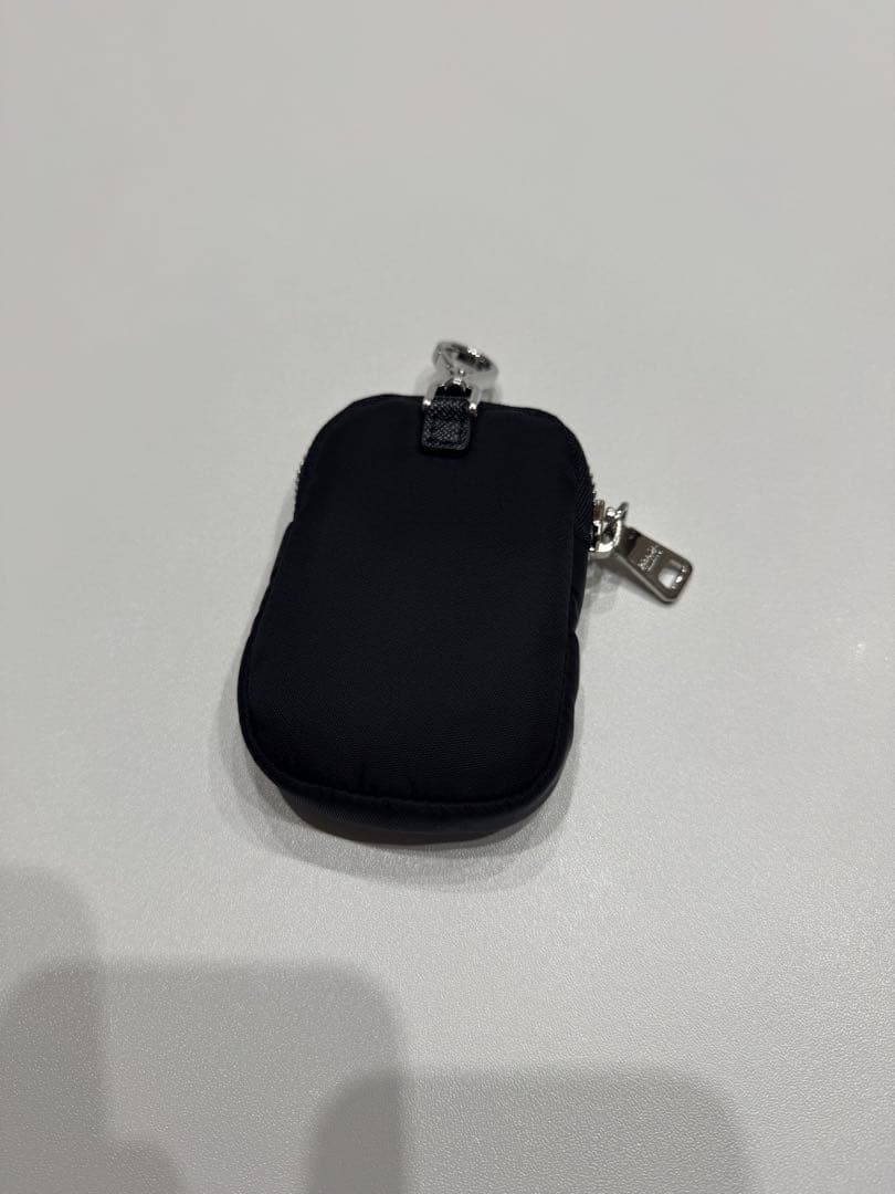 PRADA ブラック Re-Nylon ミニポーチ 1TT119
