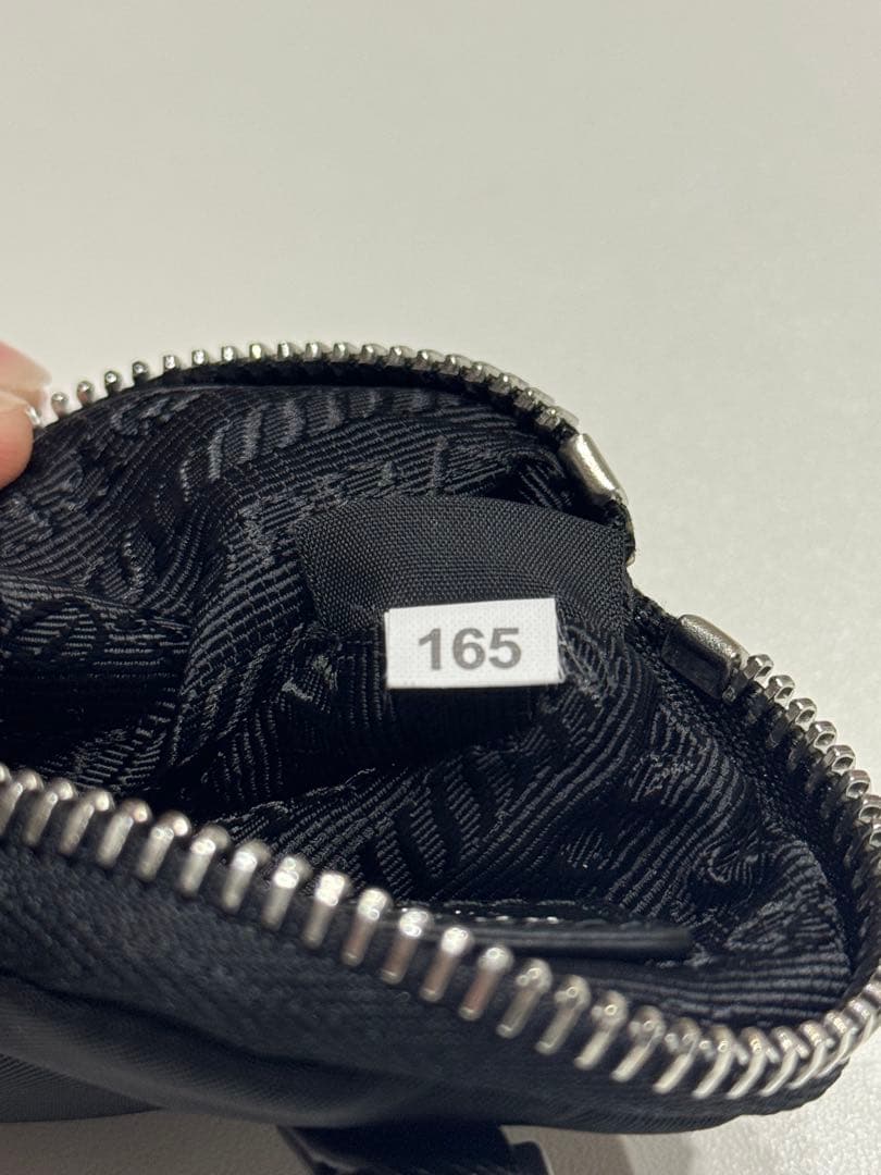 PRADA ブラック Re-Nylon ミニポーチ 1TT119