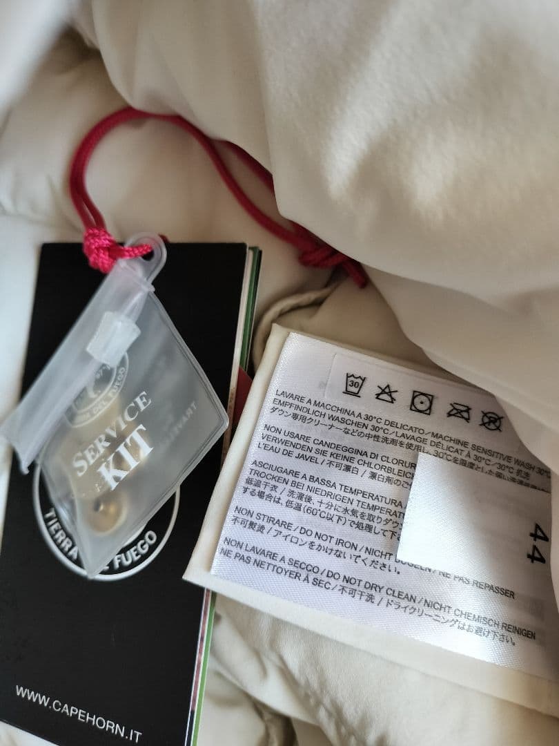 アイボリー ロングダウンジャケット フード付き