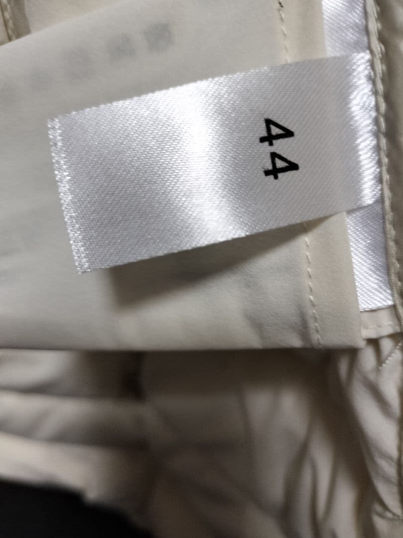 アイボリー ロングダウンジャケット フード付き