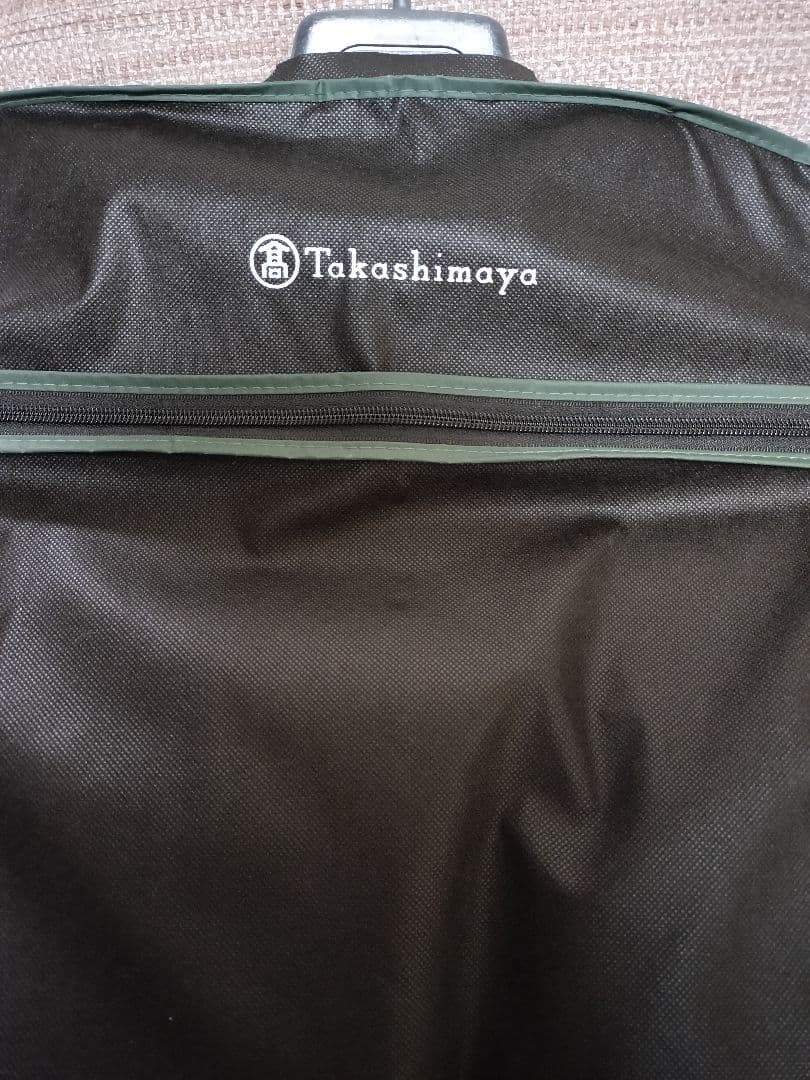 アイボリー ロングダウンジャケット フード付き