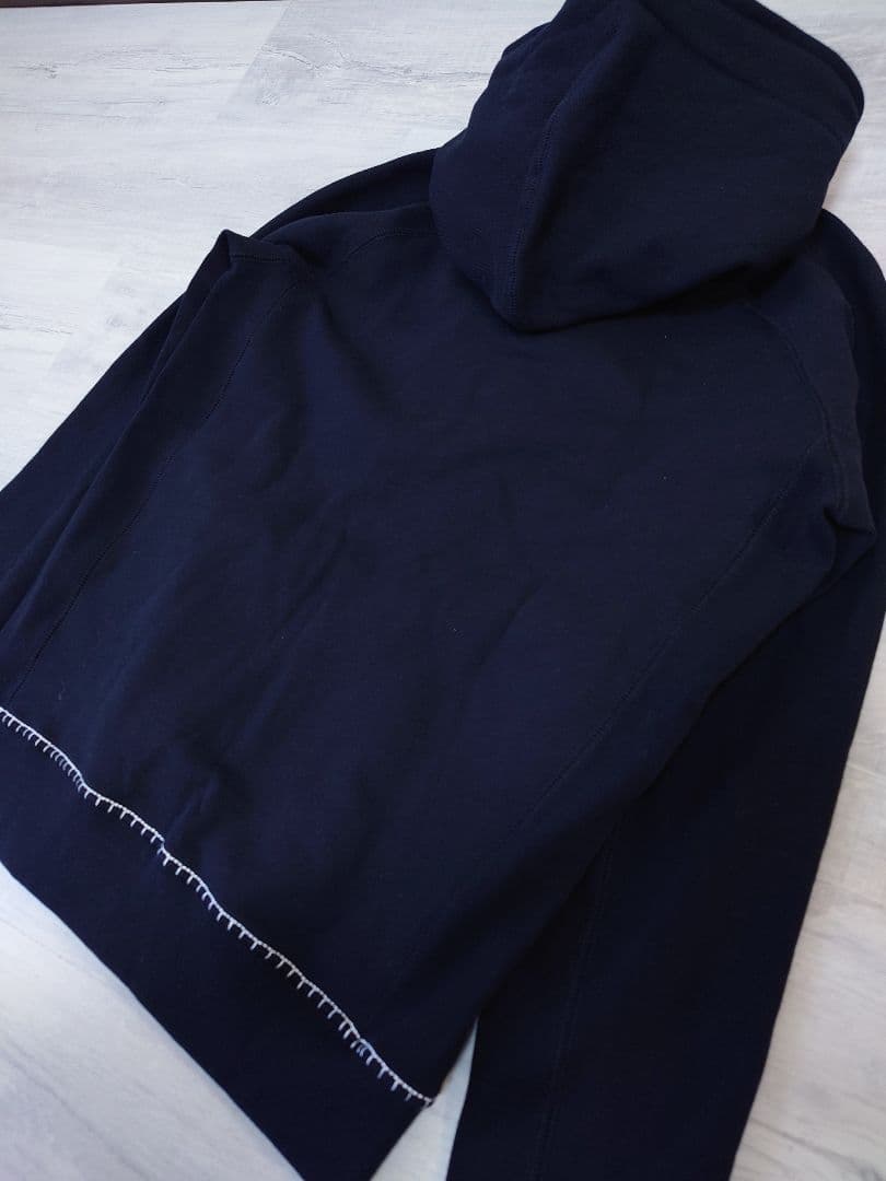 新品XLサイズ スピンドルロゴ パーカー ウノピゥウノウグァーレトレ リラックス