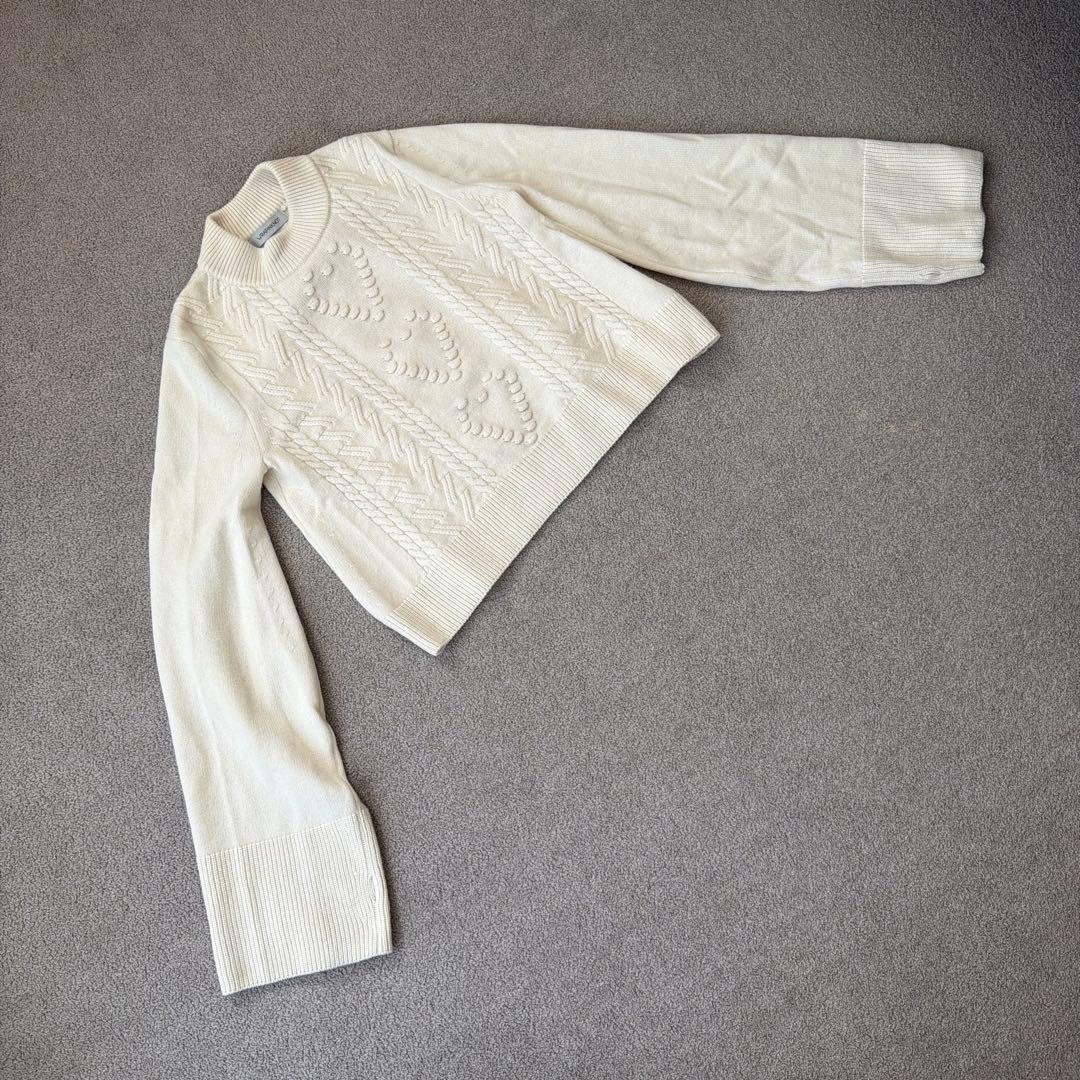 manufactured by WRAPINKNOT ニットトップス