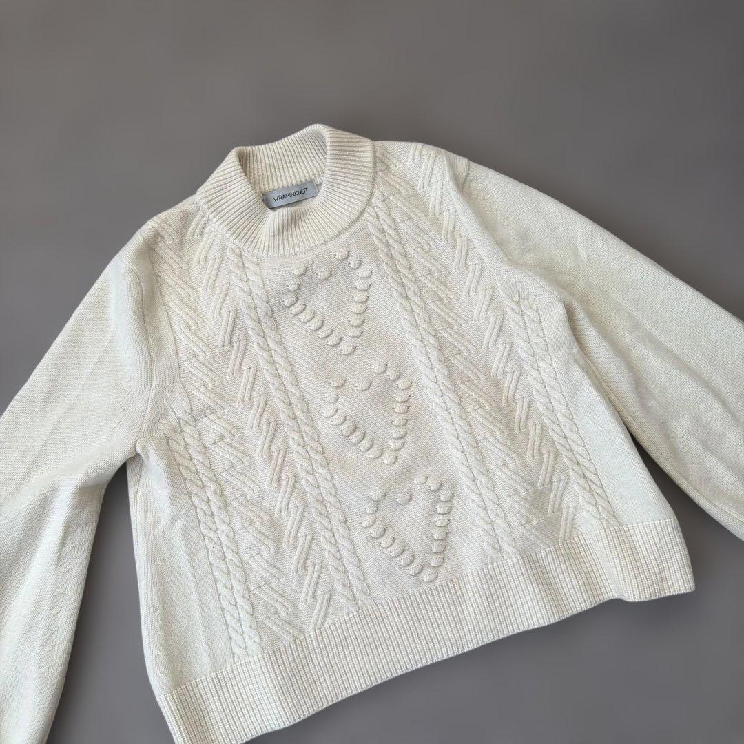 manufactured by WRAPINKNOT ニットトップス