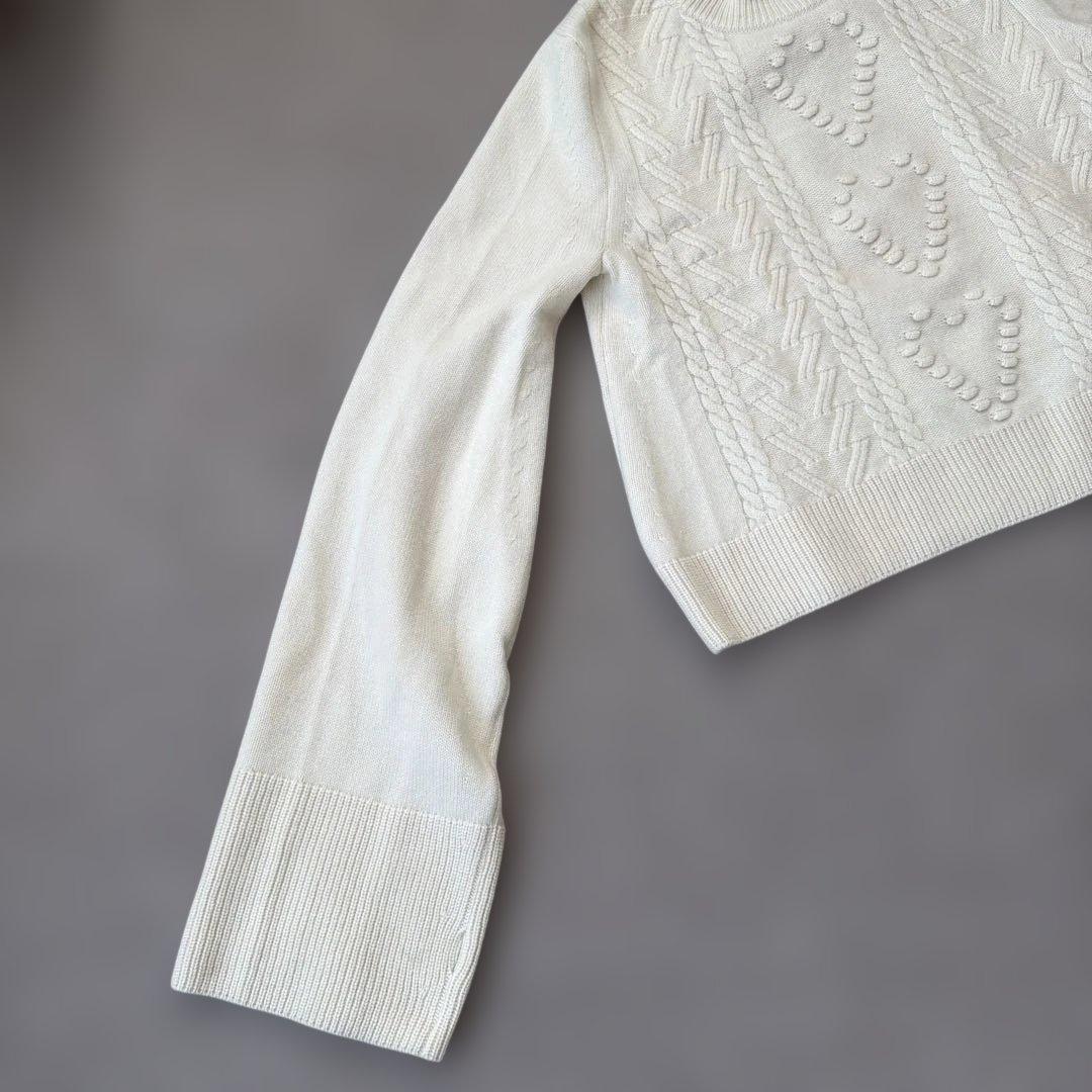 manufactured by WRAPINKNOT ニットトップス