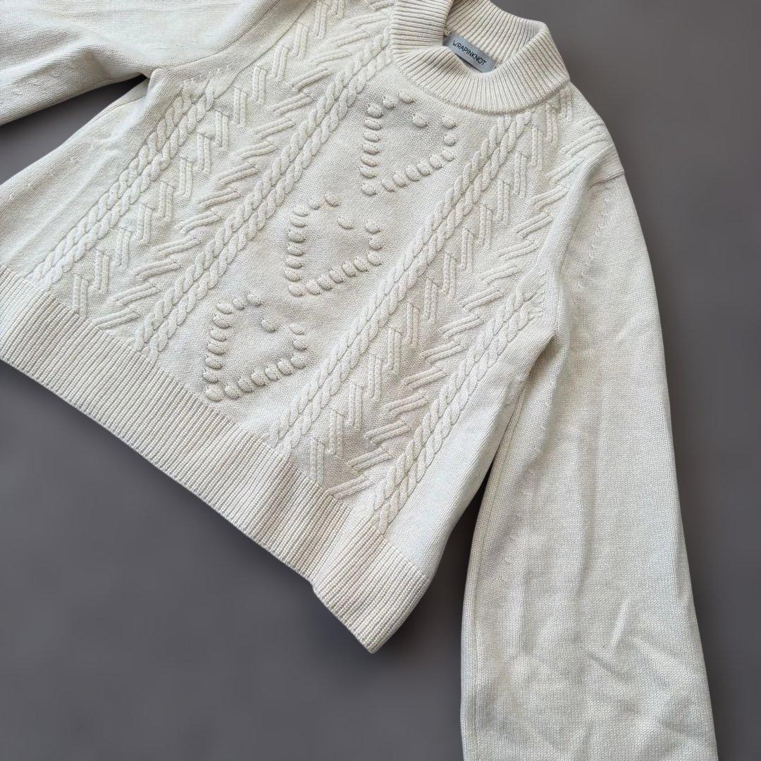 manufactured by WRAPINKNOT ニットトップス