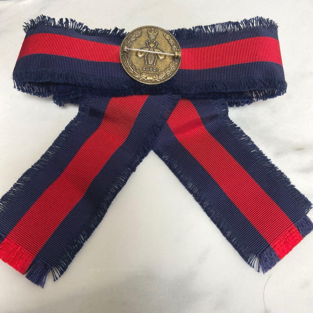 。GUCCI ウェブリボン ブローチ