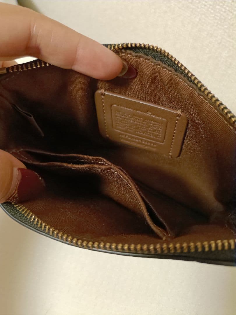 カ*ヌ様 COACH 恐竜イラスト付きポーチ