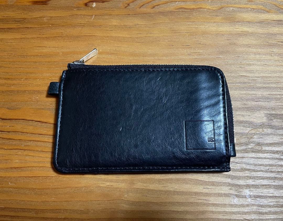 巾着付 deci L-shaped zipper compact wallet