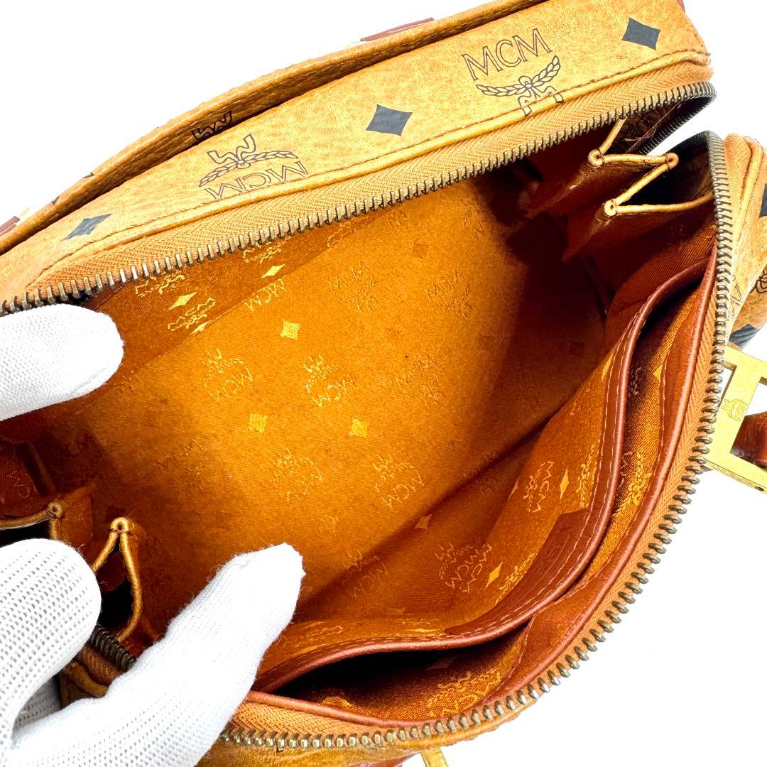 ✨美品✨MCM ミニボストン ハンドバッグ ロゴプレート 総柄 旅行バッグ 茶