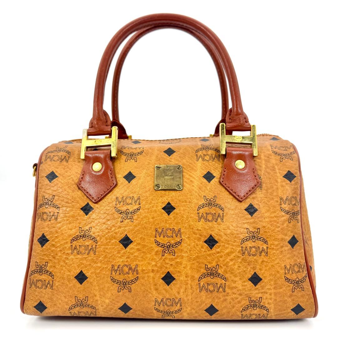 ✨美品✨MCM ミニボストン ハンドバッグ ロゴプレート 総柄 旅行バッグ 茶