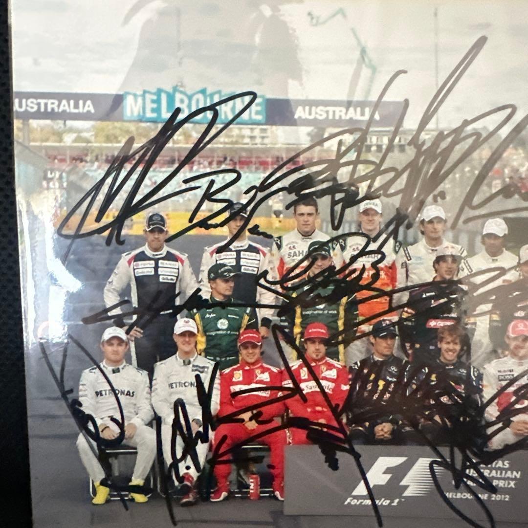 F1 ドライバー 直筆サイン入り写真 2012