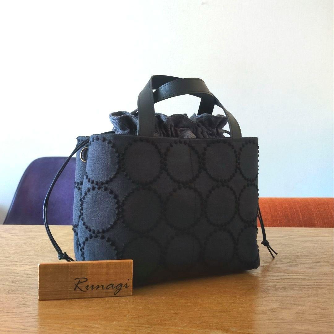 【1566】あおりポケットの巾着バッグ＊ミナペルホネン