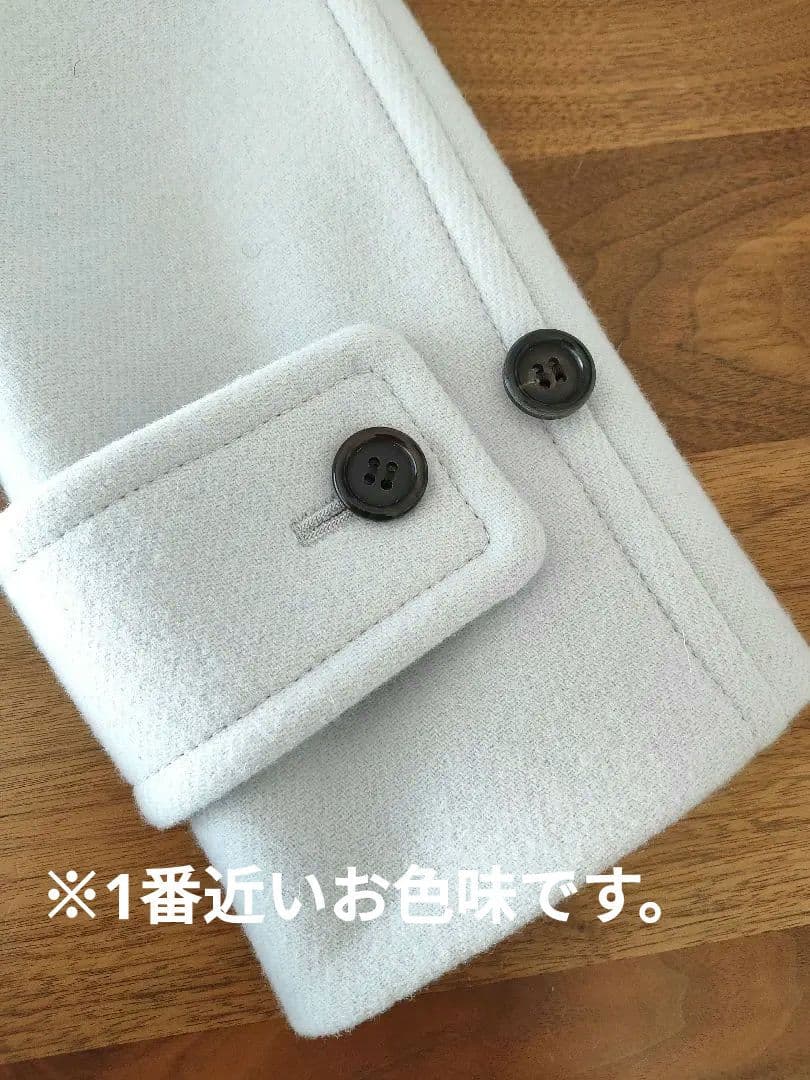 アクアスキュータム　ダッフルコート　水色